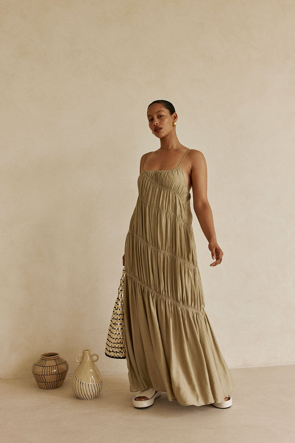 Green maxi dress with slim tie straps, back view
