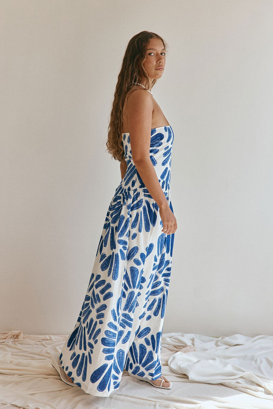 Blue maxi dress with a strapless neckline, detail view