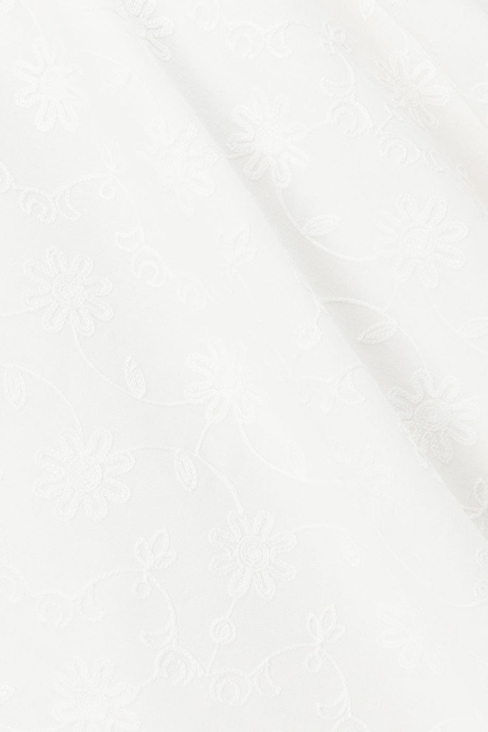White maxi dress with an A-line skirt, side view