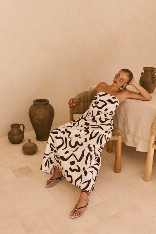 Cream maxi dress with a strapless neckline, front view