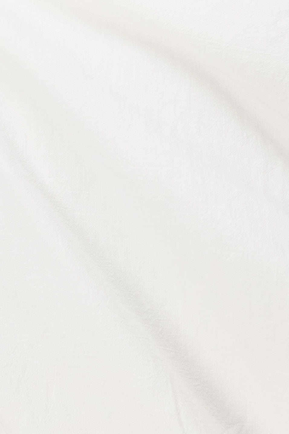 White maxi dress with a strapless neckline, detail view