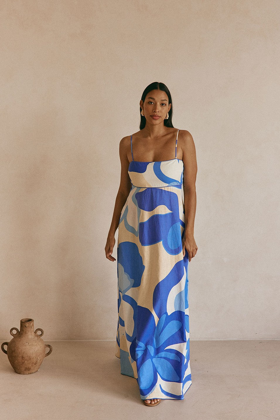 Blue maxi dress with an A-line skirt, front view