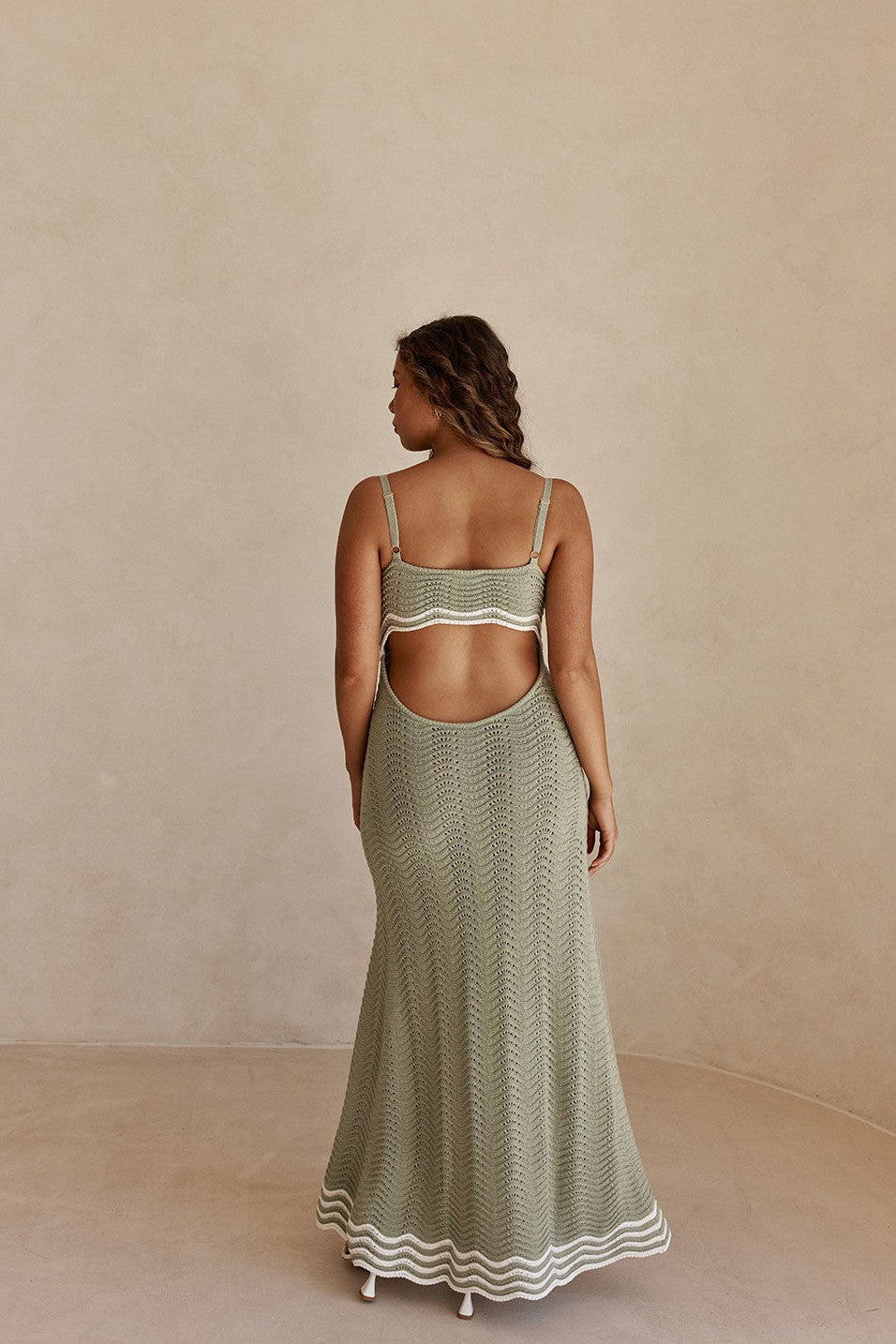 Green maxi dress with a round neckline, front view