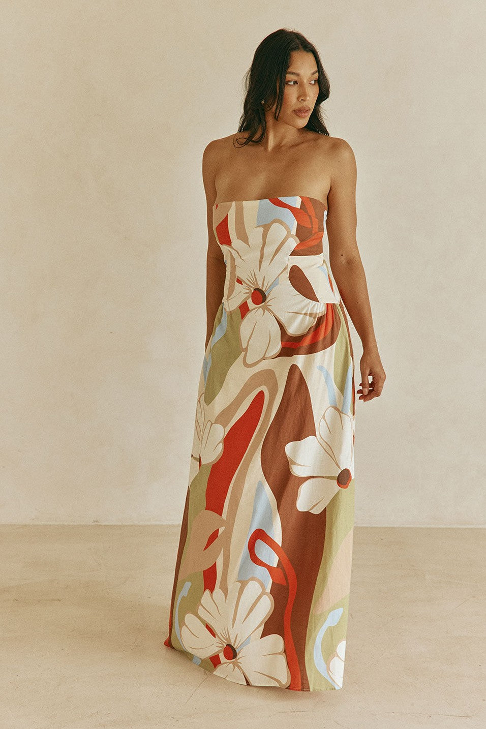 Orange maxi dress with a strapless neckline, back view
