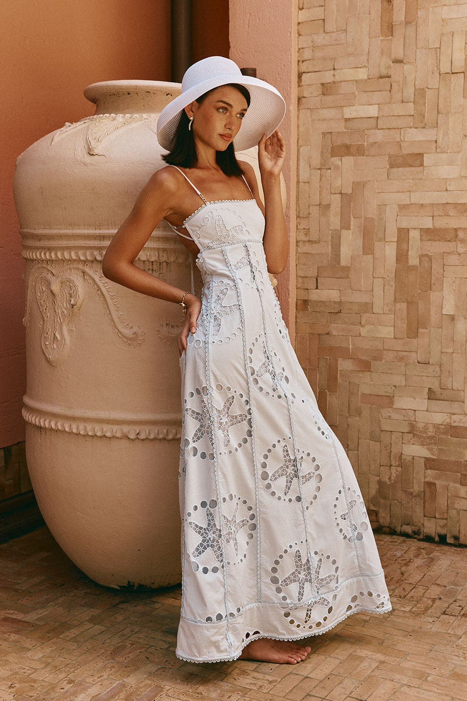 Blue maxi dress with a round neckline, side view