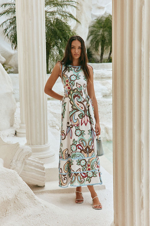 Blue maxi dress with a boat neckline, back view