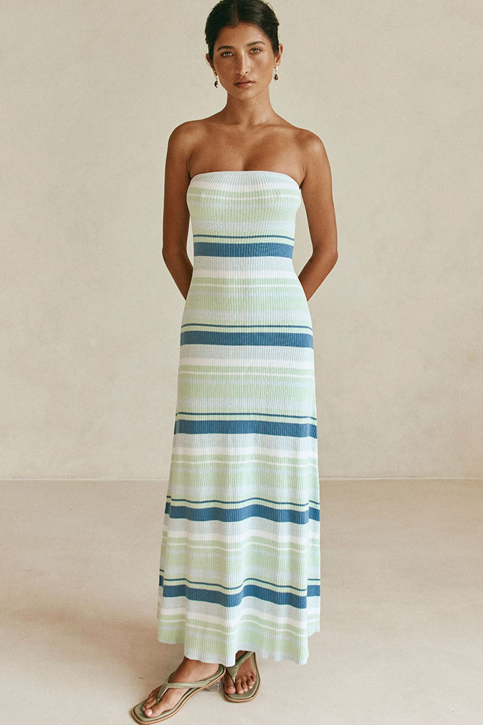 Blue maxi dress with a strapless neckline, back view