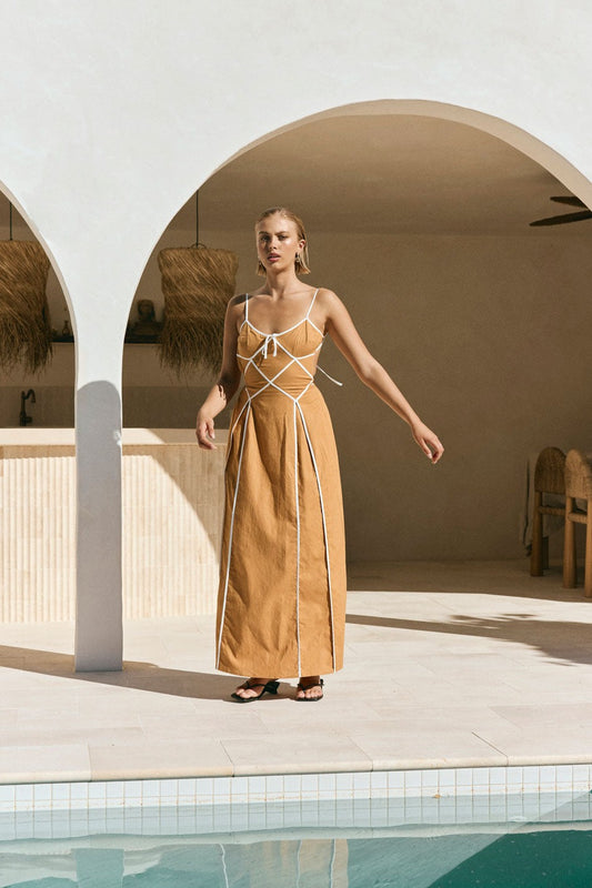 Tan maxi dress with an open back, front view