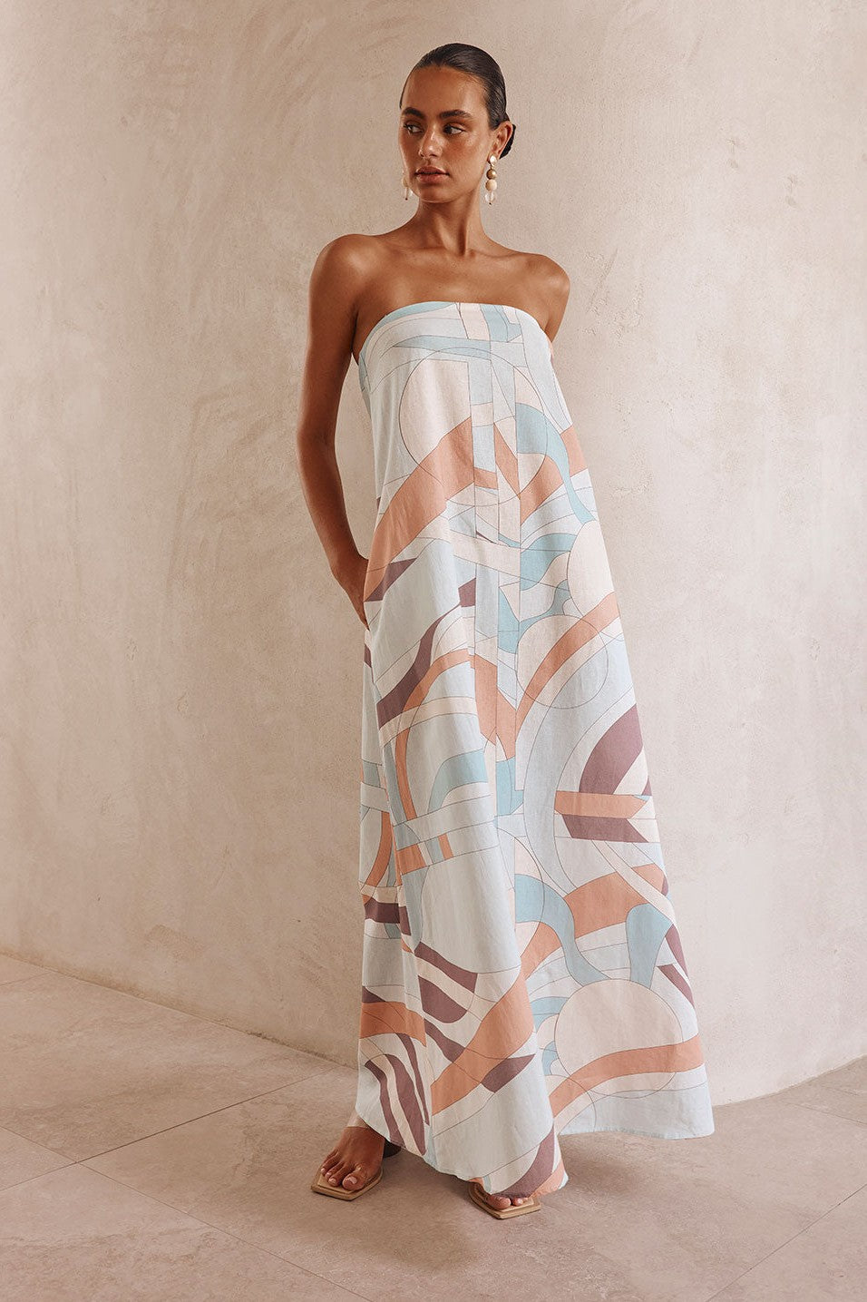 Blue maxi dress with a strapless neckline, detail view