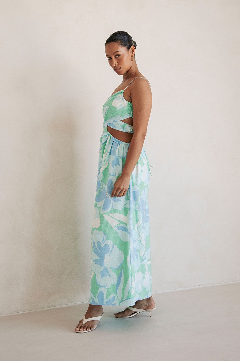 Blue midi dress with an open back, front view
