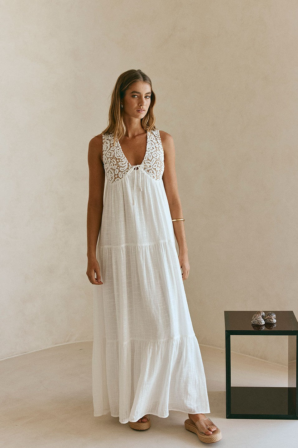 White maxi dress with a V neckline, front view