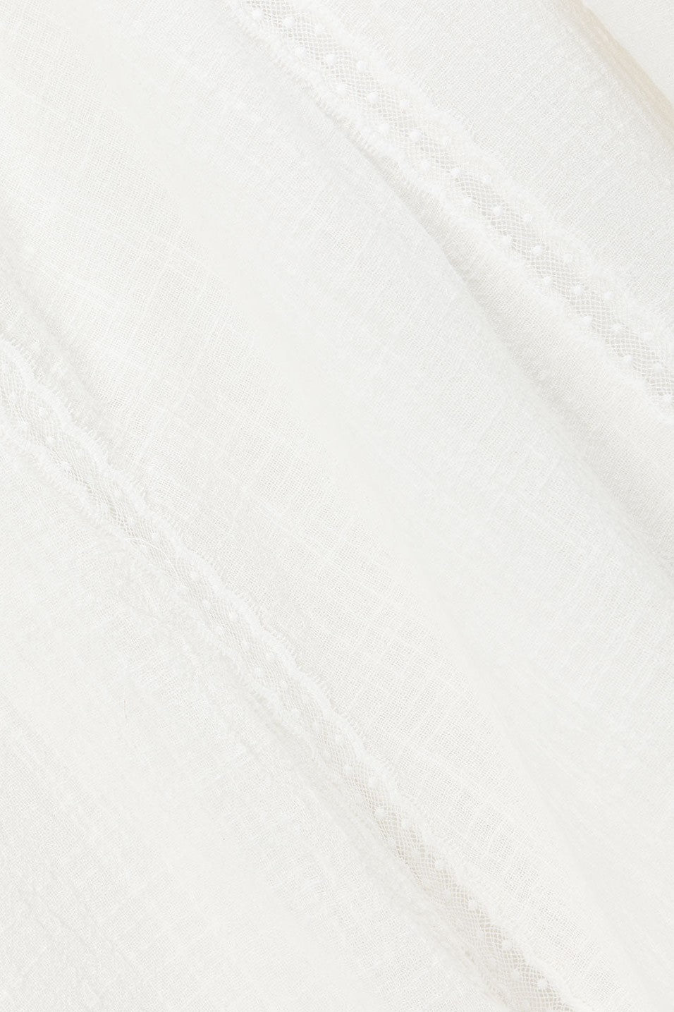 White maxi dress with an A-line skirt, detail view