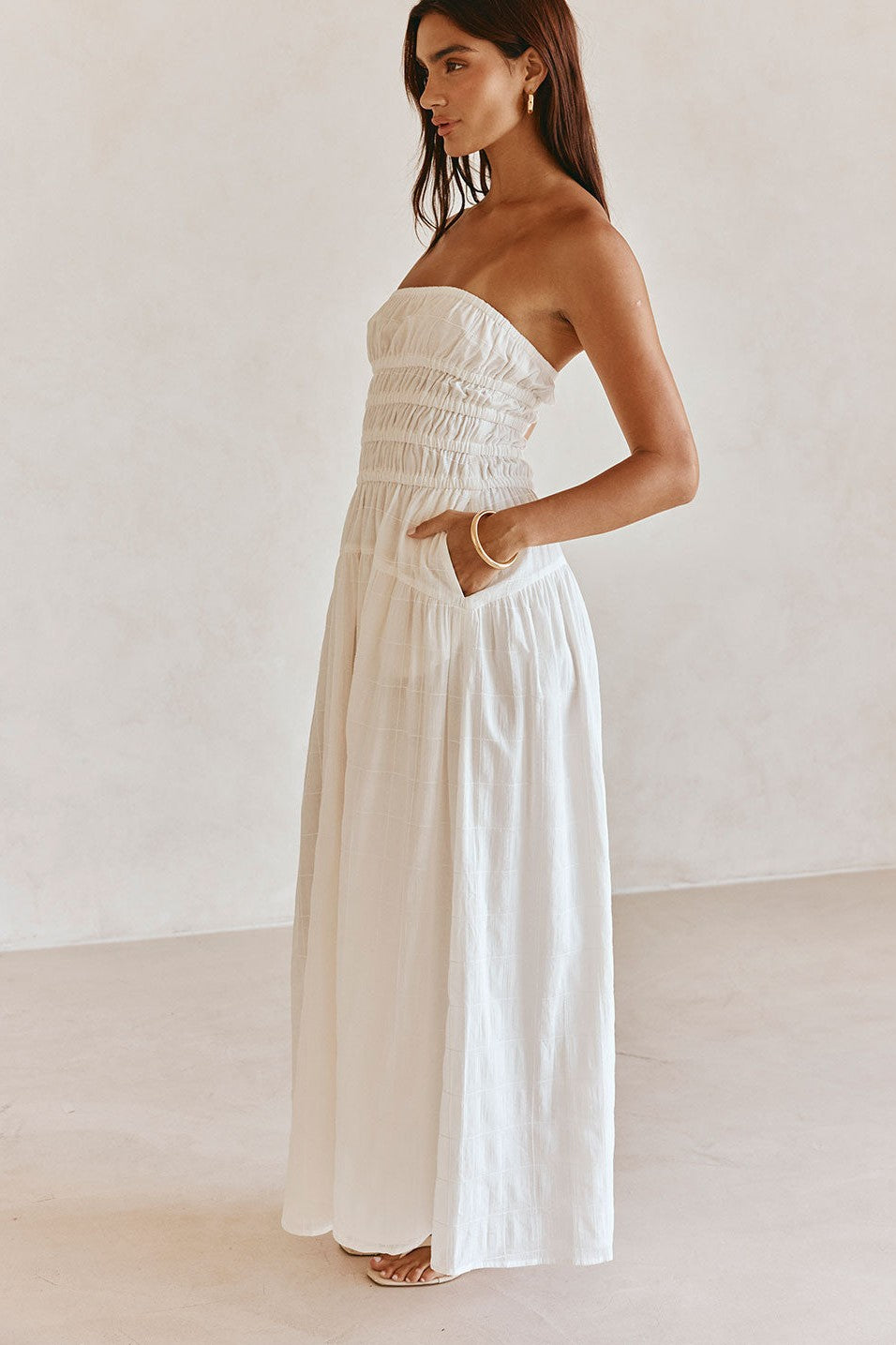 White maxi dress with a strapless neckline, front view