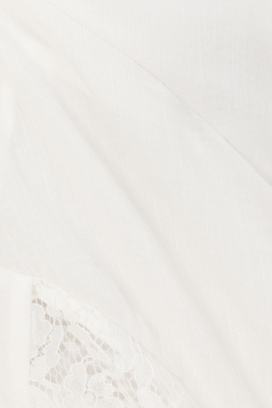 White maxi dress with lace trim, side view