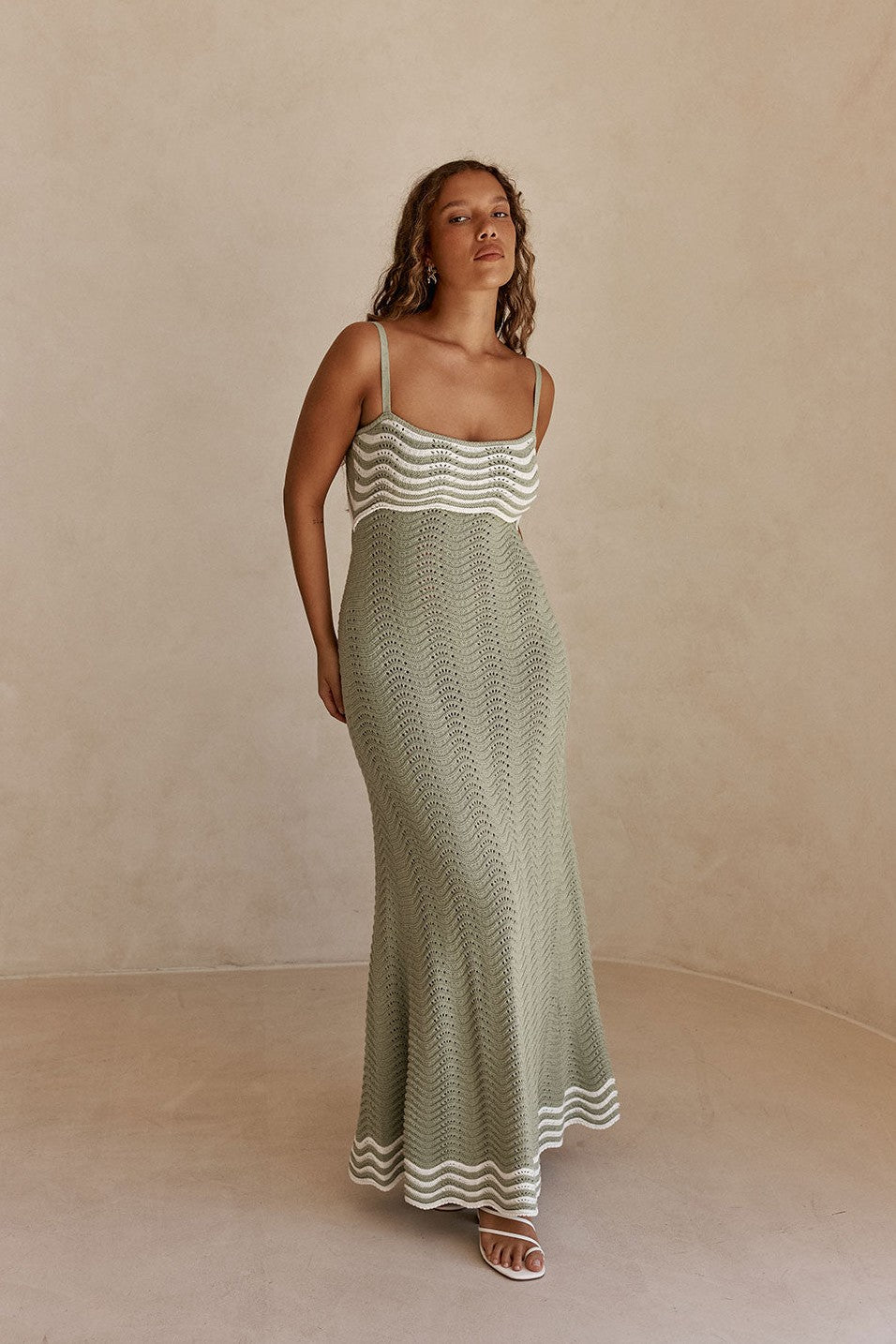 Green maxi dress with a round neckline, back view