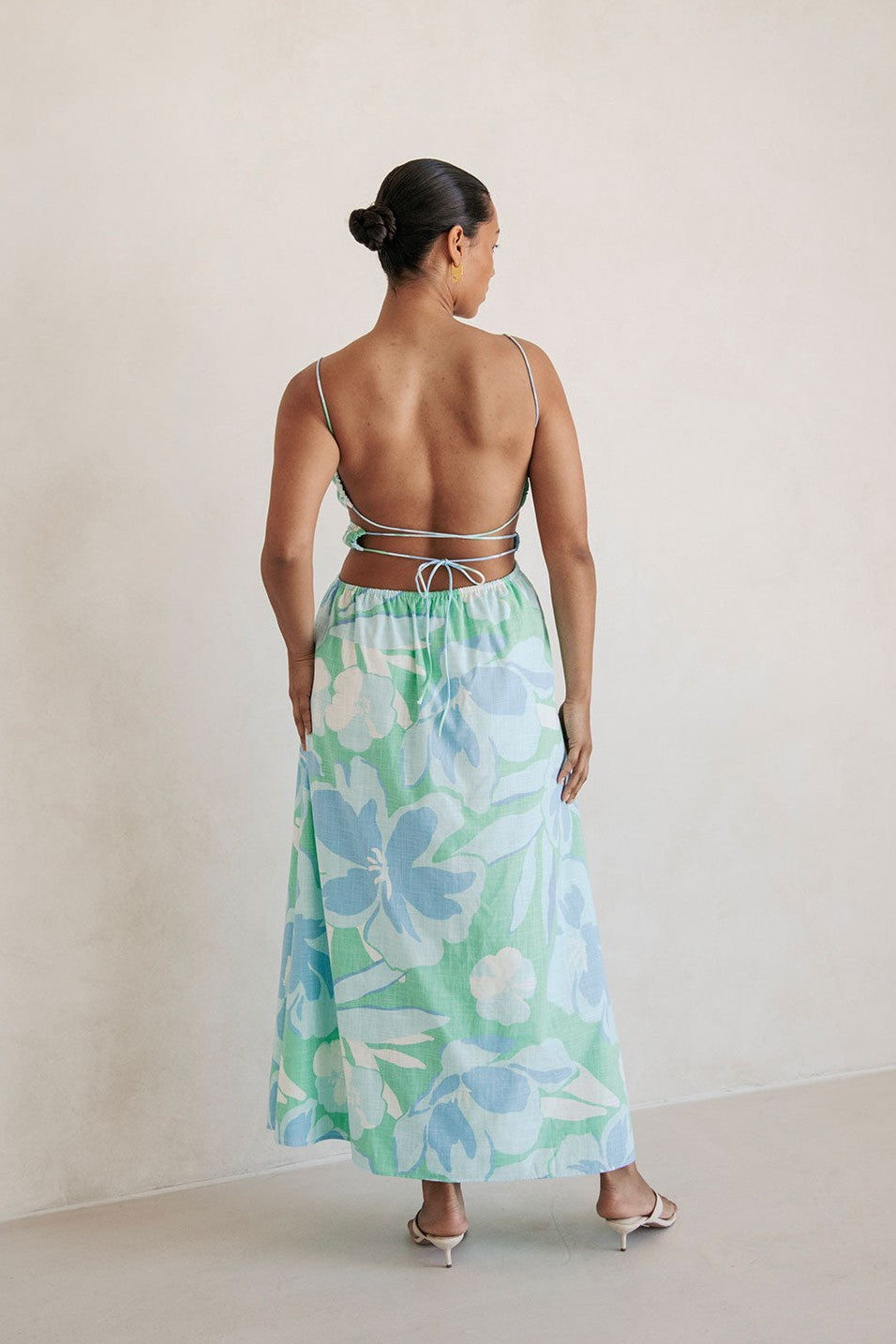 Blue midi dress with an open back, back view
