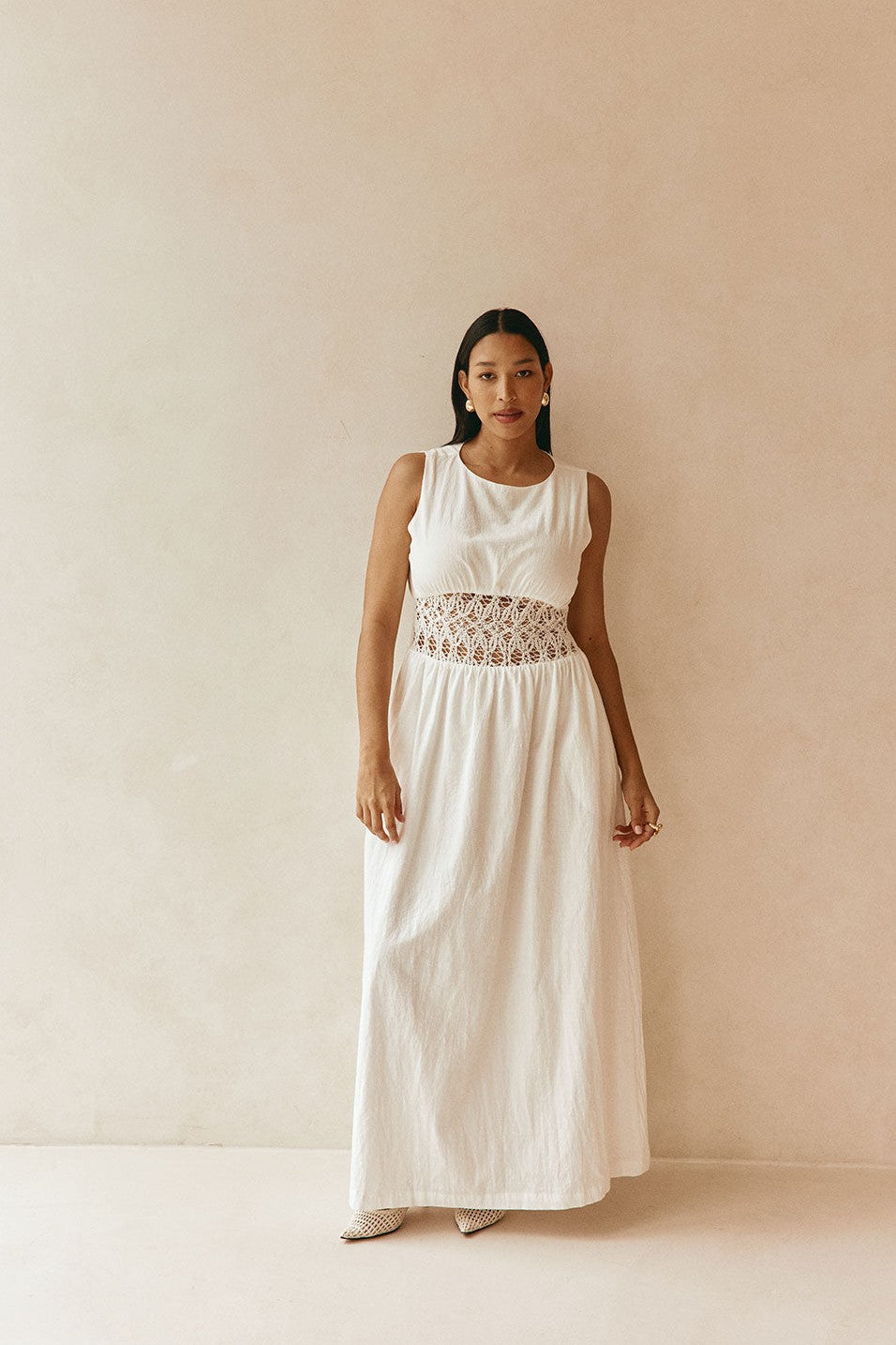 White maxi dress with a strapless neckline, back view