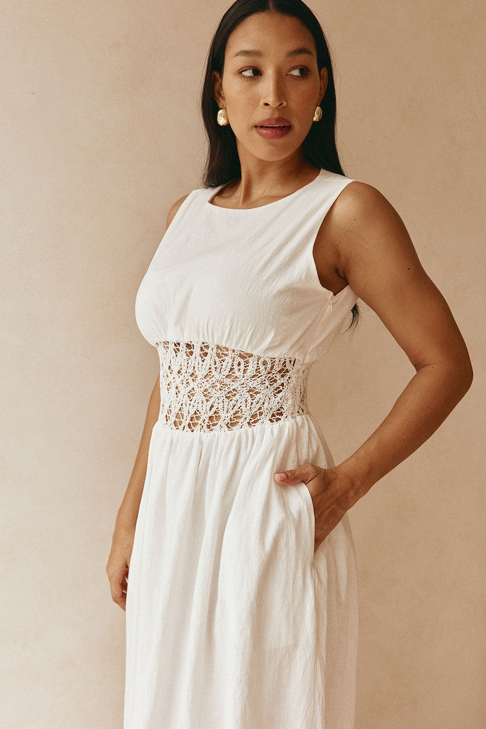 White maxi dress with a strapless neckline, detail view