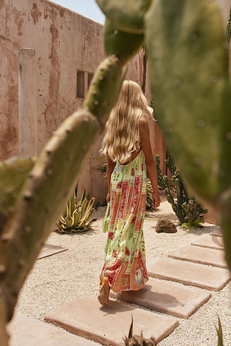 Green maxi dress with a round neckline, back view