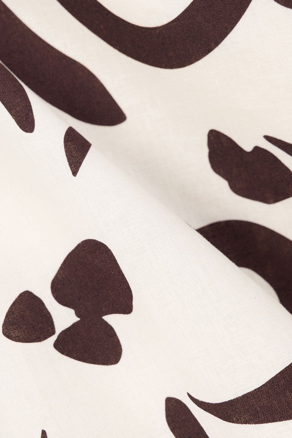 Cream mini dress with a wrap silhouette, back view