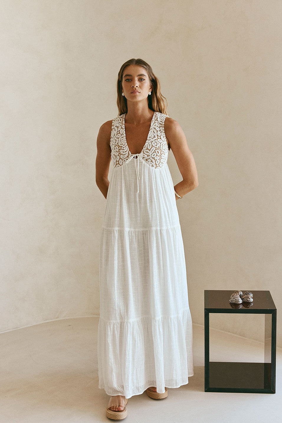White maxi dress with a V neckline, back view