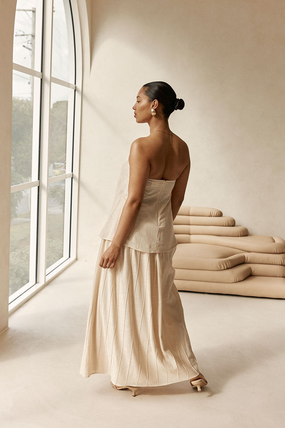 Beige maxi dress with a strapless neckline, front view