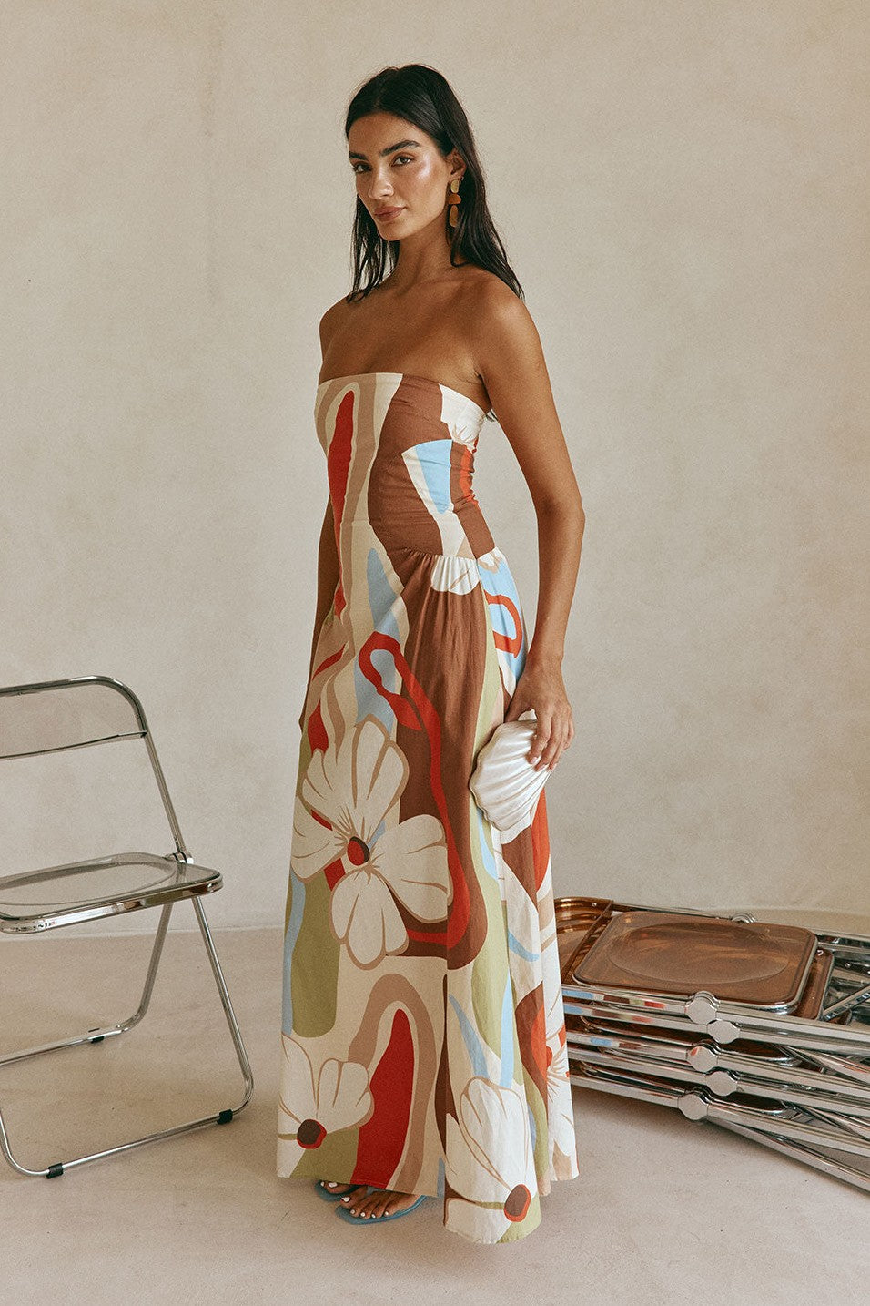 Orange maxi dress with a strapless neckline, detail view